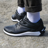 Powerlace Urban Leather auto-lacing leather shoe in Black/White, lifestyle view